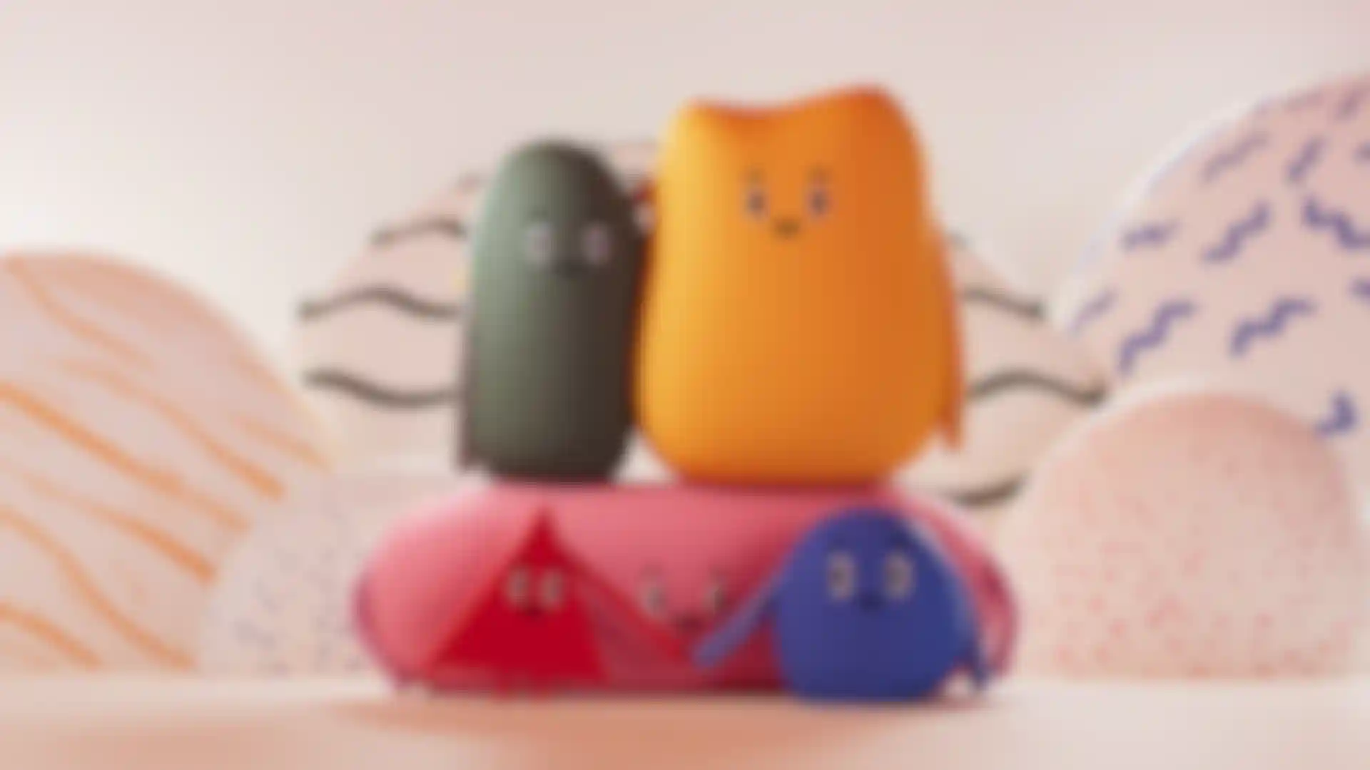 3D animated colorful geometric characters with happy faces in a playful scene